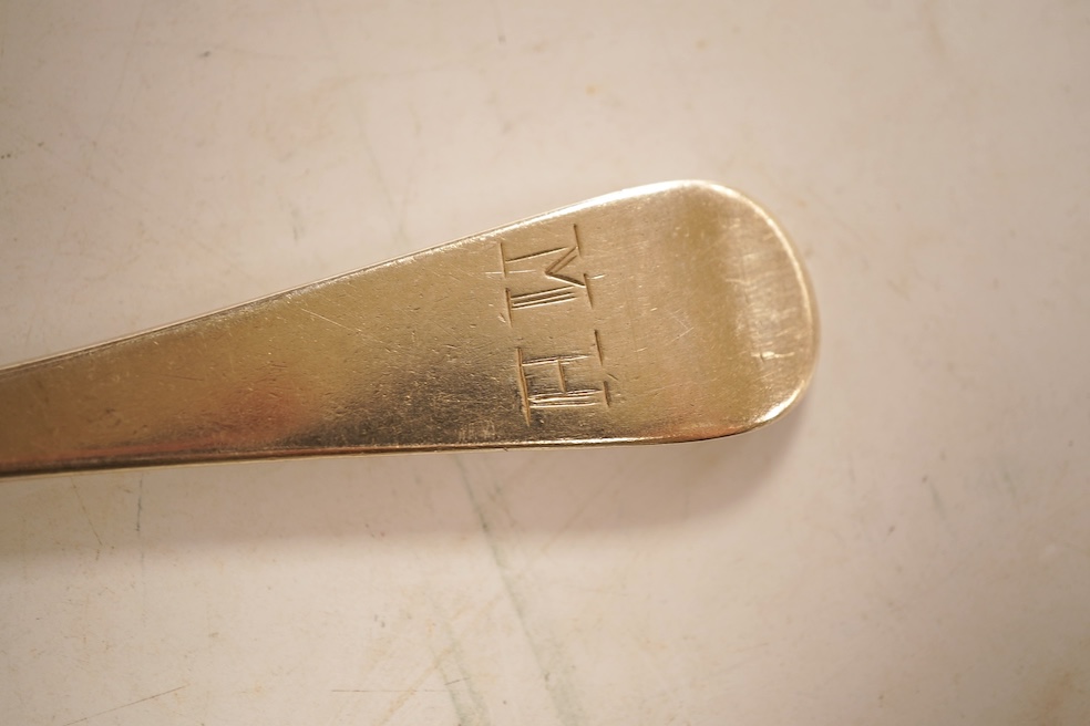 An 18th century Irish? provincial silver Hanoverian pattern tablespoon, maker's mark stamped twice 'I.T with crown above and mullet below' and 'Sterling', 20.9cm, together with eight assorted 18th century silver rat tail